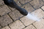 High-pressure cleaning, graffiti removal and paver sealing